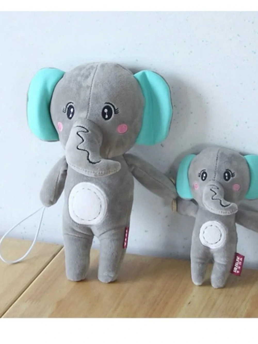 Animal curtain hold backs